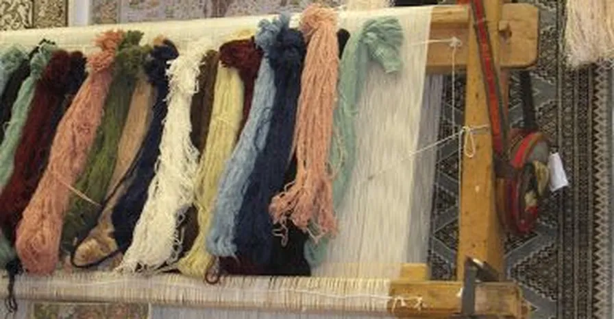 Turkish carpet artisan teaching